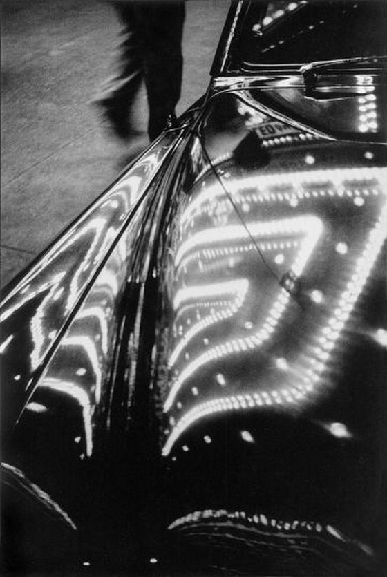 Harold Feinstein ~ Times Square lights on car